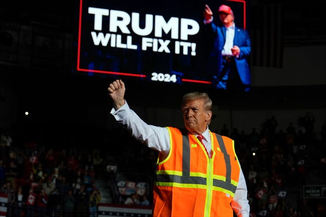 Former Republican presidential candidate Donald Trump gestures after speaking at a campaign rally at the Resch Center, Wednesday, Oct. 30, 2024, in Green Bay, Wis.